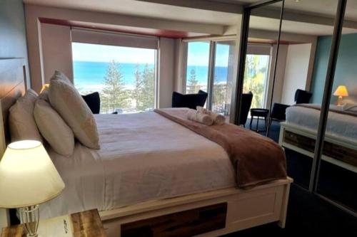 Ocean View-breath Taking Views, Amazing Facilitiesにあるベッド