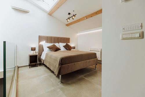 Postel nebo postele na pokoji v ubytování Le Grazie Relais & Spa
