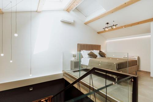 Postel nebo postele na pokoji v ubytování Le Grazie Relais & Spa
