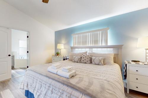 מיטה או מיטות בחדר ב-Sundrop Villa