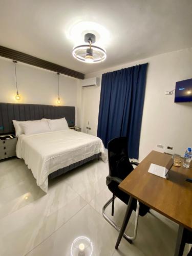 Una cama o camas en una habitación de RIG Colonial Experience