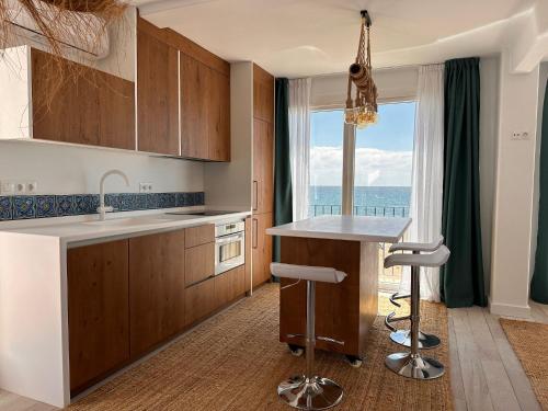 Estepona - Primera linea de playa y solarium Jo3
