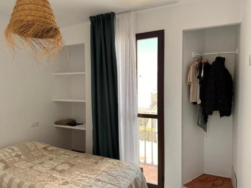 Estepona - Primera linea de playa y solarium Jo3