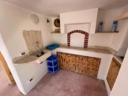 an overhead view of a kitchen with a counter at Trullo Del Salento in San Vito dei Normanni