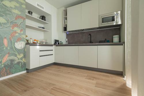 Η κουζίνα ή μικρή κουζίνα στο Villa Lucrezia - Appartamenti vista Langhe -