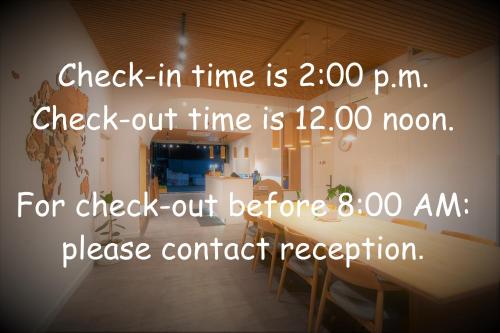 a picture of a room with a clock in time is pm at The Modeva Hotel in Kanchanaburi