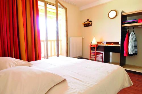 Ένα ή περισσότερα κρεβάτια σε δωμάτιο στο VTF Les Carlines