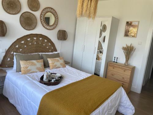 Katil atau katil-katil dalam bilik di Apartamento Comillas Beach