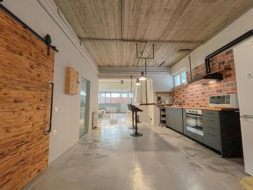 Industrial Studio with Patio