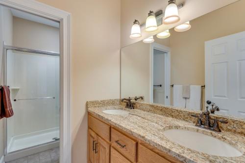 a bathroom with two sinks and a shower at Lake-View Condo with Covered Deck in Hiawassee! in Hiawassee