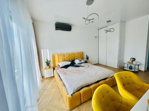 Ένα ή περισσότερα κρεβάτια σε δωμάτιο στο Horizon Park 23 Boszkowo