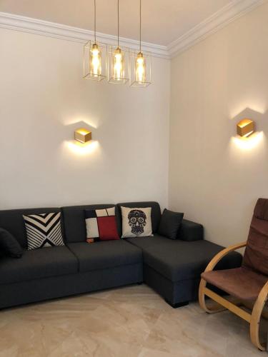 Posezení v ubytování Appartement moderne CASABAY BEACH Sidi Rahal