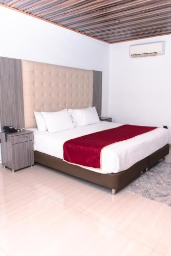 Katil atau katil-katil dalam bilik di Hotel Punta Arena Spa Boutique