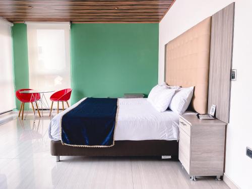 Katil atau katil-katil dalam bilik di Hotel Punta Arena Spa Boutique