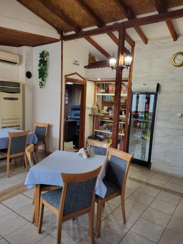 a dining room with a table and chairs at Solar in Plovdiv