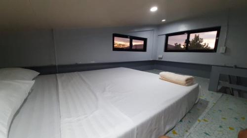Ένα ή περισσότερα κρεβάτια σε δωμάτιο στο Bleu Saphire Apartments
