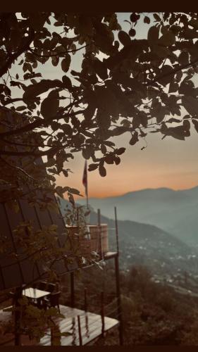 a chair sitting on top of a hill with a view at The overlook cottage 2 in Keda
