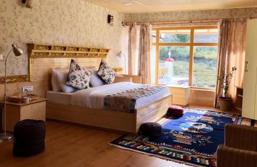 Postel nebo postele na pokoji v ubytování Fana Resort