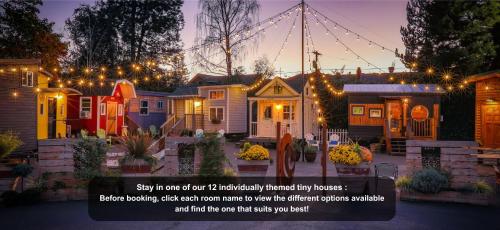 a picture of a house with christmas lights at Tiny Digs - Hotel of Tiny Houses in Portland