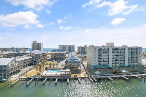 an aerial view of a city with a marina at Lei Lani Village 112 by Vacation Homes Collection in Orange Beach