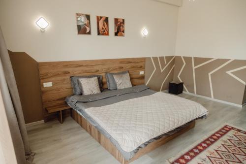 Кровать или кровати в номере Hotel Graf T