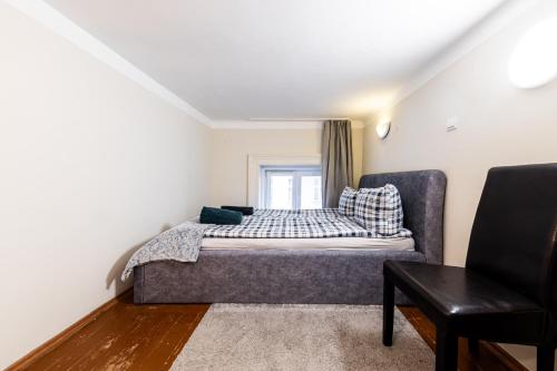 Postel nebo postele na pokoji v ubytování Urban Rooms
