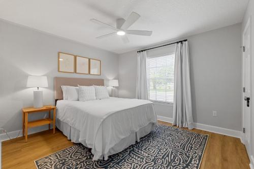 a bedroom with a bed and a window at Island Suite - Walk to Downtown! in St. Augustine