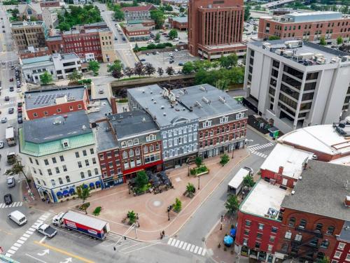 an aerial view of a city street with buildings at Canal View, DTWN Historic Hotel, Fiber Internet, Room # 209 in Bangor