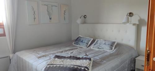 Postel nebo postele na pokoji v ubytování Alppitalo huoneisto