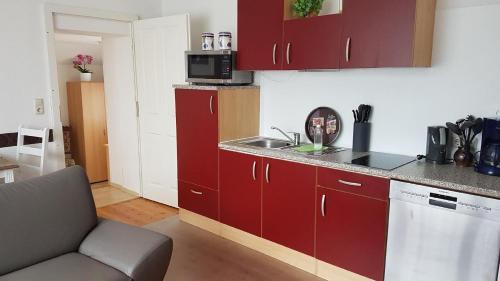 A cozinha ou cozinha compacta de Ferienwohnung im Erdgeschoss - b48673