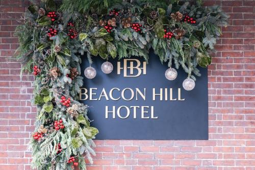 Un certificado, premio, letrero u otro documento en Beacon Hill Hotel