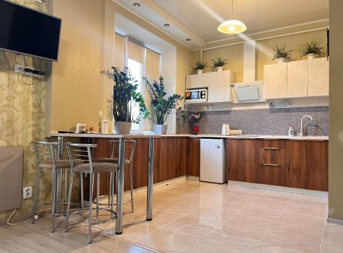Kjøkken eller kjøkkenkrok på Apartments on Perspektivnaya