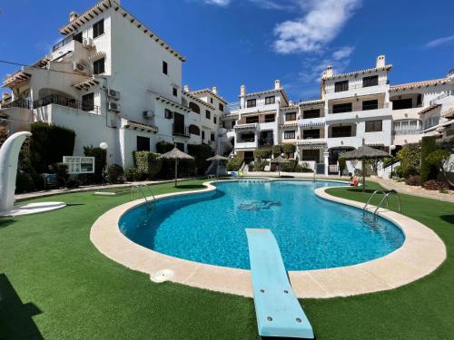 Πισίνα στο ή κοντά στο Lobo en Cabo Apartment, Cabo Roig , Orihuela Costa