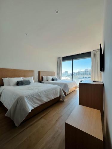Olson Hotel Real Acueductoにあるベッド