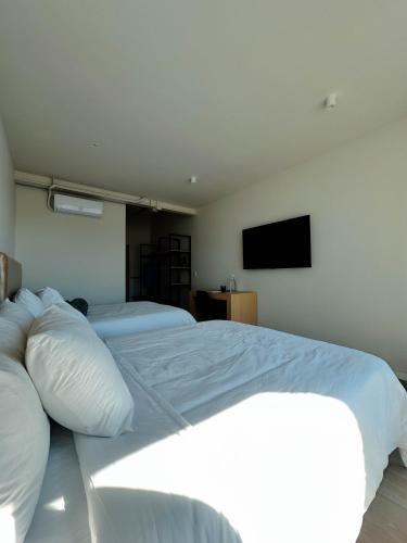 Olson Hotel Real Acueductoにあるベッド