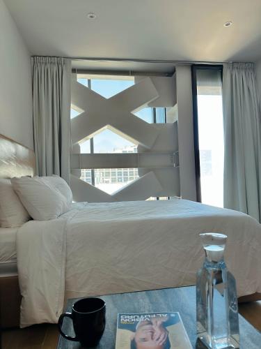 Olson Hotel Real Acueductoにあるベッド