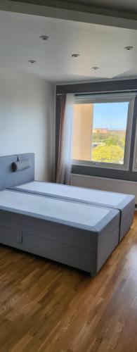Ein Bett oder Betten in einem Zimmer der Unterkunft Eurowizja 2024