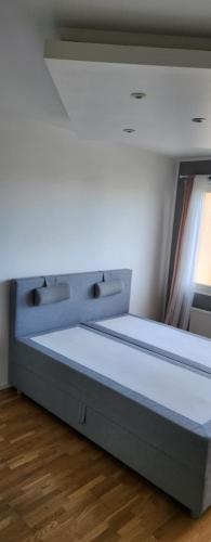 Ein Bett oder Betten in einem Zimmer der Unterkunft Eurowizja 2024