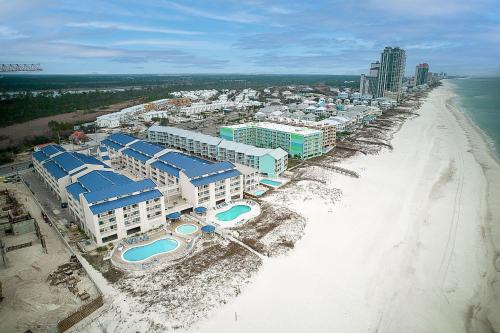 an aerial view of a resort on the beach at Sugar Beach 301 by Vacation Homes Collection in Gulf Shores