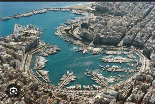 an aerial view of a harbor with boats in the water at Qqueen House in Piraeus