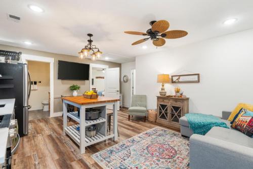 a living room with a couch and a table at Autumn Creek Branson in Branson