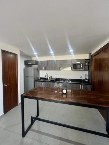 Cucina o angolo cottura di Departamento céntrico Vallarta Shaddai