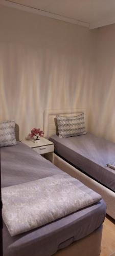 Ένα ή περισσότερα κρεβάτια σε δωμάτιο στο B.A.A Sabiha Gökçen