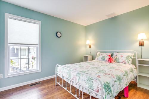 a bedroom with a bed and a window at Near Beaches and Shops Canal-Front Selbyville Home in Selbyville