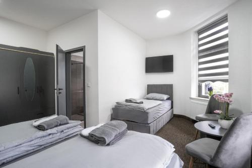 Postel nebo postele na pokoji v ubytování Duisburger Hostel
