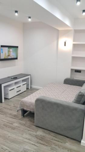 Кровать или кровати в номере AIRHOTEL
