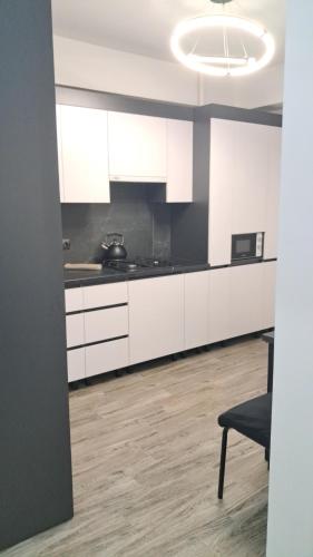 Кухня или мини-кухня в AIRHOTEL
