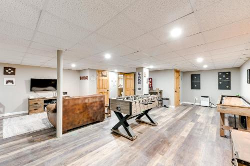 a large room with a ping pong table in it at Pet-Friendly Pocono Lake Home with Private Hot Tub! in Pocono Lake