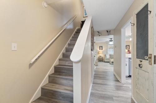 a hallway with stairs in a house at Gulf View 16 by Vacation Homes Collection in Gulf Shores