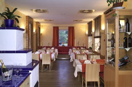 Restaurant ou autre lieu de restauration dans l'établissement Gasthof zur Grenze